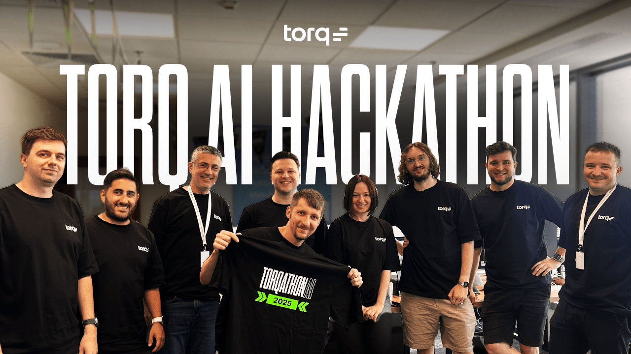 Torq team collaborating during an AI hackathon